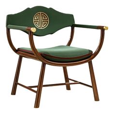 a green chair with a gold emblem on the armrests and seat cushion is sitting in front of a white background