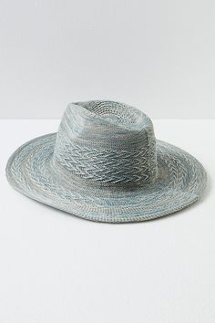 Add an effortless detail to your outfits with this sleek wide brim hat, featured in a packable design so you can look chic anywhere the wind takes you. **Features:** Structured style, packable design, woven fabrication, dipped crown, wide brim **Why We | Arrow Woven Packable Hat by Free People in Grey Chic Lightweight Panama Hat With Curved Brim, Chic Curved Brim Packable Sun Hat, Chic Woven Sun Hat With Curved Brim, Chic Packable Sun Hat With Curved Brim, Chic Sun Hat With Curved Brim And Foldable Design, Chic Packable Brimmed Sun Hat, Trendy Lightweight One Size Hats, Trendy Packable Sun Hat With Curved Brim, Chic Lightweight Hats With Short Brim