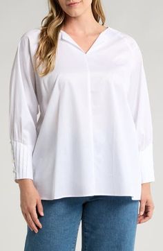 The simple style of this top cut from smooth, refined cotton with pleated sleeves gives it the versatility to easily cross from casual to styled-up looks with ease. 24 1/2" length Split neck Long sleeves with button cuffs 100% cotton Machine wash, dry flat Made in Turkey Chic Pleated Cotton Top, Classic Cotton Tops With Pleated Sleeves, Cotton Pleated Tops For Work, Relaxed Fit Tops With Pleated Sleeves For Daywear, Cotton Tops With Pleated Sleeves And Relaxed Fit, Classic Cotton Pleated Blouse, Modern Tops With Cuffed Sleeves For Fall, Classic Tops With Pleated Sleeves For Daywear, Classic Pleated Office Tops