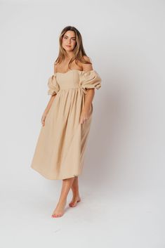 The Hamilton is everything you're looking for in a midi dress - charming, sophisticated, and absolutely flattering. It features premium quality details, like a sweetheart neckline and gorgeous balloon sleeves that can be worn on or off the shoulder. It's an unforgettable choice for every body type, and extra-comfy for expecting mamas! The best part? You can wear this beauty long after your sweet baby arrives! Available in multiple colorways. FIT: Runs true to size. Features a smocked back panel for comfort. This dress is roomy in the waist and will accommodate early maternity in your true size, but consider sizing up if you are in advanced pregnancy. MATERIAL: GARMENT DETAILS: Empire-waisted midi dress, with sweetheart neckline and statement balloon sleeves that can be worn on or off the s Spring Brunch Off-shoulder Dress With Sweetheart Neckline, Spring Off-shoulder Dress With Sweetheart Neckline For Brunch, Spring Off Shoulder Dress With Sweetheart Neckline For Brunch, Spring Sweetheart Neckline Off Shoulder Dress For Brunch, Midi Dress With Sweetheart Neckline For Day Out, Fitted Feminine Off Shoulder Midi Dress, Spring Midi Dress With Sweetheart Neckline For Brunch, Fitted Off Shoulder Dress With Puff Sleeves For Brunch, Fitted Puff Sleeve Off Shoulder Dress For Brunch