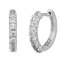 A bit of dazzle, a touch of fascination and a lot of style, these beautiful diamond hoop earrings are sure to add glamour to any occasion. Shimmering diamonds blaze a twinkling path down the shiny gold hoop ready to transition from day to night. - Fourteen diamonds are finely cut for brilliance, near colorless, prong set and weigh 1/4ct tw - Diamonds are certified to be ethically and responsibly sourced - Earrings are crafted of fine quality 10 karat white gold for a lifetime of wear - Free clea Gadget Gifts, Diamond Hoop Earrings, Natural Earth, Stone Cuts, 2 Carat, Diamond Stone, Round Cut Diamond, Diamond White, Ring Verlobung