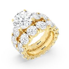 an 18k yellow gold ring set with round brilliant cut diamonds on the band and sides