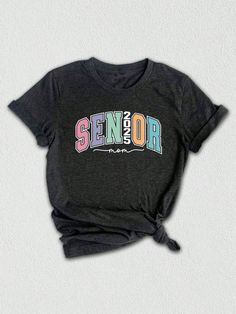 Get ready to celebrate the graduating class of 2025 with this trendy and stylish Senior 2025 T-shirt!  Designed specifically as a thoughtful graduation gift, this tee is perfect for seniors, college students, and anyone looking to commemorate this special milestone in style. Featuring a unique design that combines all the key elements of a truly memorable senior year, this shirt is a must-have for anyone in the class of 2025. ✨ The eye-catching graphic showcases the words "Senior 2025" in bold, Graduation T-shirt With Letter Print In Relaxed Fit, Black T-shirt With Graphic Print For Graduation, Black Graphic Print T-shirt For Graduation, Black Tops For College End Of School Year, Black Tops For College Events At School Year-end, Short Sleeve T-shirt With Text Print For Graduation, Black Letter Print T-shirt For Graduation, Graphic Tee Tops With Graphic Print For Graduation, Black T-shirt With Letter Print For Graduation