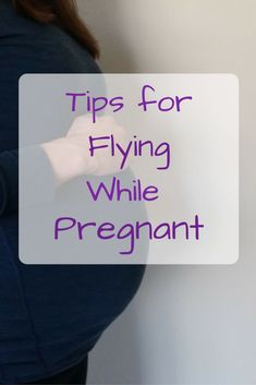 a pregnant woman's belly with text overlaying tips for flying while pregnant