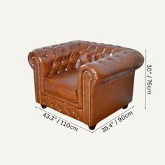 an image of a leather couch with measurements