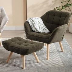 two chairs and a footstool in a living room with a rug on the floor