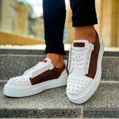 Introducing the "Celtics Earthy Frame." Embrace the pristine allure of white, elegantly bordered by rich brown sides and highlighted by a spiked toe cap. Meticulously crafted from vegan leather, these sneakers exude style and embody Apollo's orthopedic excellence. Key Features: White Vegan Leather with Brown Sides and Spiked Toe Cap: Offering purity with a dash of flair. Apollo's Orthopedic Comfort: Seamlessly blending style with unmatched foot wellness. Celtics Design by Apollo Moda: Tailored f White Custom Sneakers With Rubber Heel Cap, Casual Brown Sneakers With Studded Rubber Outsoles, Custom White Sneakers With Rubber Heel Cap, Brown Low-top Sneakers With Rubber Toe Cap, Casual Brown Sneakers With Studded Outsoles, Custom Leather Lace-up Sneakers With Rubber Toe Cap, Leather Lace-up Custom Sneakers With Rubber Toe Cap, White Lace-up Custom Sneakers With Rubber Heel Cap, Brown Lace-up Sneakers With Rubber Toe Cap