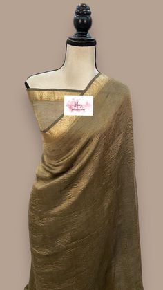 Pure tissue banaras saree with blouse piece fall & pico done Gold Pre-draped Saree With Dupatta In Cotton Silk, Unstitched Cotton Silk Saree For Celebration, Gold Saree With Sheer Dupatta In Slub Silk, Festive Unstitched Chanderi Suit With Blouse, Festive Chanderi Unstitched Suit With Blouse, Celebration Cotton Silk Unstitched Saree Suit, Unstitched Cotton Silk Suit For Celebrations, Festive Gold Unstitched Slub Silk Suit, Unstitched Gold Slub Silk Blouse Piece