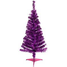 purple tinsel christmas tree with pink ornament on top, in front of white background