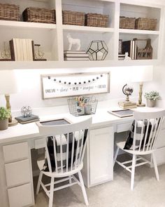 a home office with white desks and chairs