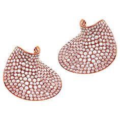 Its a very unique structured earring made out of round-rose cut 9.3 carat diamonds in 18 karat rose gold. What makes the piece eye-catchy is the shape and the glitter which comes from G-H color grade and SI1 clarity. It looks like a beautiful dried leaf. It comes with Omega back closure. JEWELRY SPECIFICATION: Approx. Metal Weight: 20.49 gram Approx. Diamond Weight: 9.30 Cts Diamond Shape: Round Diamond Color: GH Diamond Clarity: SI1 Approx. Number of Diamonds: 480 Everyday Diamond Earrings, White Gold Earrings Studs, Rose Gold Earrings Studs, White Gold Studs, Rose Gold Studs, Dainty Studs, Square Earrings Studs, 3 Carat, Antique Earrings