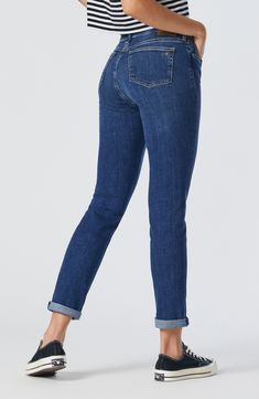 Faded and distressed for a vintage appearance, these soft and stretchy jeans have a slim fit and a full inseam that looks good cuffed or worn long. 13" leg opening; 10" front rise; 15 1/2" back rise 65% cotton, 13% lyocell, 13% polyester, 7% recycled cotton, 2% elastane Machine wash, dry flat Made in Turkey High-rise Medium Wash Jeans With Rolled Hem, High Rise Jeans With Rolled Hem, Trendy High Rise Jeans With Rolled Hem, Spring Jeans With Rolled Hem In Medium Wash, Trendy High-rise Jeans With Rolled Hem, High Rise Relaxed Fit Jeans With Rolled Hem, Medium Wash Straight Leg Bottoms With Rolled Hem, Relaxed Fit Denim Jeans With Cuffed Ankles, Mid-rise Dark Wash Jeans With Rolled Hem