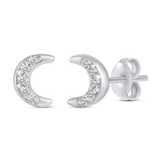 She'll love the celestial theme of this charming diamond three-pair stud earrings set. Crafted in sterling silver, this set features dainty diamond-touched earrings - one pair each of curved lightning bolts, crescent moons and four-pointed stars. Captivating with 1/10 ct. t.w. of diamonds and a bright polished shine, these earrings secure with push-screw backs. Celestial Diamond Silver Earrings, Sterling Silver Moon-shaped Jewelry For Anniversary, White Gold Moon Shaped Jewelry For Anniversary, White Gold Moon-shaped Anniversary Jewelry, Celestial Diamond Earrings With Diamond Accents, Fine Jewelry Crescent Cubic Zirconia, Fine Jewelry Crescent Shaped Cubic Zirconia, Celestial Diamond Earrings With Accents, Celestial Jewelry With Round Cut Diamond Accents