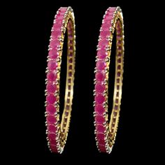 Add a pop of vibrant color to your look with our Pink Bangle from Agulka Jewels. The stunning Ruby Bangle complements the India-inspired design, creating a captivating piece of jewelry. The 22K Gold Plated finish adds a touch of luxury and elegance, while the Pakistani Bangle design brings cultural charm. Elevate your style with this exquisite and sophisticated bangle that exudes grace and allure. Let this be the perfect accessory to make a statement and add a touch of glamour to your ensemble. Elegant Pink Bangle For Festivals, Red Hand Set Bangle For Party, Pink Bollywood Bracelets For Celebration, Red Bollywood Bracelets For Celebration, Pink Bollywood Celebration Bracelets, Pink Bangle Jewelry For Diwali, Pink Bangle For Diwali Party, Hand Set Red Bangle For Celebration, Hand Set Ruby Bracelets For Party