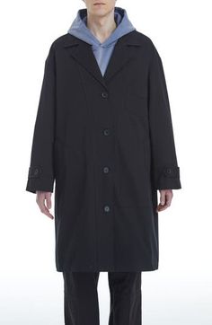 A military-inspired trench coat cut in an oversized, easy-to-layer fit offers polished style with notched lapels, belted cuffs and roomy pockets. Front button closure Notched lapels Belted cuffs Chest patch pocket; front welt pockets Back vent 100% cotton Machine wash, line dry Imported Winter Workwear Raincoat, Single-breasted, Winter Workwear Raincoat Single Breasted, Winter Single-breasted Raincoat For Work, Long Raincoat With Button Closure For Work, Classic Workwear Raincoat With Button Closure, Classic Raincoat With Button Closure For Work, Classic Button Closure Raincoat For Work, Winter Workwear Raincoat With Button Closure, Single Breasted Raincoat For Workwear