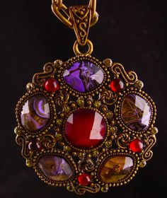 Ornate Jeweled Pendant Jewelry, Bohemian Gold Necklaces With Stone Setting, Bohemian Gold Necklace With Stone Setting, Jeweled Crystal Costume Jewelry Necklaces For Gifts, Jeweled Crystal Costume Necklaces For Gifts, Jeweled Crystal Costume Jewelry Necklace For Gift, Rhinestone Pendant Necklace, Costume Jewelry Style, Bohemian Jeweled Pendant Necklace, Bohemian Jeweled Purple Jewelry