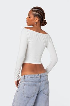 Online Only! Upgrade your basics with the Edikted Tahlia V Neck Off Shoulder Top from Edikted. This long sleeve, off-shoulder top features a stylish V-neck detail that adds an extra pop to your look. Versatile and chic, it's perfect for any occasion and can be paired effortlessly with anything in your closet. 


	Top
	Off shoulder V neck
	Long sleeves
	Cotton, Spandex
	Model wears size S
	Model height is 5'9
	Item care: Wash with similar color Fitted White Off-shoulder Top For Fall, White Stretch Off-shoulder Long Sleeve Top, White Stretch Long Sleeve Off-shoulder Top, White Fitted Off-shoulder Top, Trendy Fitted One Shoulder Long Sleeve Top, White Long Sleeve Off-shoulder Top For Fall, Fitted Long Sleeve Off-shoulder Top For Spring, Trendy Stretch One Shoulder Top With Long Sleeve, Trendy Stretch One-shoulder Long Sleeve Top