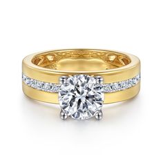 a yellow and white gold engagement ring set with a round diamond in the center, surrounded by two rows of diamonds