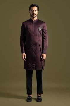 Plum purple full sleeves achkan with mystic cut dana swerve thread and maal embroidery on one side. Paired with a black trouser. - Aza Fashions Designer Long Sleeve Kurta For Festive Occasions, Designer Bandhgala With Zari Work And Long Sleeves, Reception Sherwani With Cutdana And Long Sleeves, Designer Long Sleeve Bandhgala With Zari Work, Long Sleeve Sherwani With Cutdana For Reception, Designer Long Sleeve Kurta, Long Sleeve Kurta With Dabka For Reception, Designer Sets With Resham Embroidery And Long Sleeve, Long Sleeve Kurta For Reception