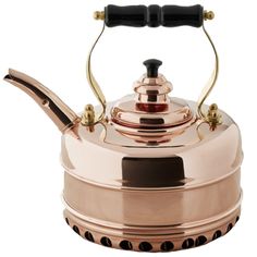 a copper colored tea kettle with a black handle