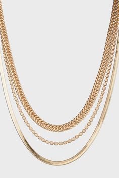 Our combination of chunky chain, dainty round charm chain and, an on-trend flat herringbone chain is a layering formula we're living for. A set of three multitextured chains brings instant shine to your neckline with this stylish, pre-layered Francis chain necklace. Material: Alloy, matte fine gold + KC gold Size: 9.5" (Longest), 8.5" (Middle), 7.5" (Shortest) + 3" Extension Lobster clasp Trendy Multi-strand Chunky Chain Jewelry, Trendy Layered Necklace With Double Chain Link, Trendy Layered Chain Link Necklace, Trendy Multi-strand Layered Chain Necklace, Trendy Layered Necklace With Chunky Chain, Trendy Chunky Chain Layered Necklace, Trendy Double Strand Chunky Chain Necklace, Trendy Double Strand Necklace With Chunky Chain, Snake Chain Necklace With Double Chain For Layering