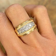 "This ring is made from 14-karat yellow gold and set with 0.125-carats of diamonds in bezel setting in the middle that highlight with a thick straight line on each side. We think this ring is a perfect wedding band with a glimpse of sparkle. Metal: 14k yellow gold Width: 10.0 mm band Ring Size: 5 3/4 US Diamonds: Approximately 0.125-carats Weight: 4.5 grams Hallmarks: \"14K\" **If you want us to adjust the ring size, please contact us before you place an order. Ready to ship and gift eligible." Thick Diamond Band, Thick Wedding Bands, Thick Gold Band, Yellow Gold Diamond Wedding Band, Fancy Diamond Ring, Ring Jewellery Design, Gold Diamond Wedding Band, Golden Ring, Engagement Ring Sizes