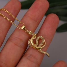 This snake jewelry piece showcases a delicate and dainty design. The snake symbolizes transformation, rebirth, and wisdom, while the moon represents feminine energy, intuition, and cycles of life! Our necklace serves as a unique expression of style and personality. It's an exquisite piece that effortlessly complements any outfit, adding a touch of mythological allure to your look. It also makes a thoughtful gift for that special someone in your life. ✨ ✦ NECKLACE DETAILS: * Pendant Size: 3.7 Cen Cheap Snake Chain Necklace For Women As A Gift, Luxury Goddess Style Necklace For Gift, Cheap Snake Chain Necklace As A Gift, Luxury Mystical Necklace For Gift, Luxury Symbolic Necklaces For Women, Luxury Mythological Pendant Necklaces, Luxury Symbolic Snake-shaped Jewelry, Luxury Elegant Snake Necklace, Luxury Adjustable Snake-shaped Jewelry