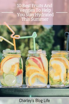 three mason jars filled with fruit and veggies to help you stay hydrated this summer