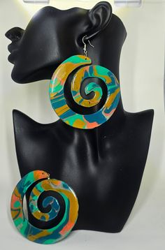 These earrings are beautifully hand painted. They are completely unique in style and color combinations. No two pairs are identical. These earrings measure 3.4 inches in length. Multicolor Hand Painted Earrings, Green Artistic Dangle Earrings, Unique Colorful Earrings With Ear Wire, Green Dangle Earrings With Artistic Design, Unique Multicolor Plug Earrings As Gift, Artsy Green Drop Earrings, Green Artsy Drop Earrings, Colorful Hand-painted Drop Earrings, Colorful Hand Painted Drop Earrings