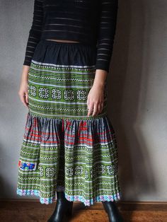 Maxi skirt BK green is a very unique skirt made by the Hmong tribe using their vintage textile. With beautiful patterns and amazing hand embroidery, this boho skirt is a must-have piece of clothing. To make it wearable for everyone, we sew elastic for the waist. 🪡Size: Length 89 cm, elastic waist 60-83 cm ( model is 167 cm tall and her weight is 65 kg) 🪡Material: cotton, printed fabric, vintage hand embroidery fabric Maxi Rock, Unique Skirt, Hmong Clothes, Boho Rock, Unique Skirts, Embroidery Skirt, Sewing Elastic, Boho Skirt, Mode Boho