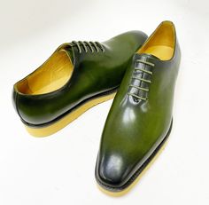 Style: 518-01-Olive Stylish lace-up Oxford from the Carrucci by Maurice collection in a Smooth Calfskin features soft Calfskin lining, a clean welt, and a super lightweight Yellow Rubber Sole! Classic Green Oxfords For Business, Green Plain Toe Oxfords With Goodyear Welt, Green Goodyear Welted Plain Toe Oxfords, Green Plain Toe Leather Shoes For Work, Business Green Leather Shoes With Goodyear Welt, Green Goodyear Welted Leather Shoes For Business, Green Leather Sole Oxfords For Work, Green Leather Sole Oxfords For Business, Green Oxfords With Leather Sole For Work