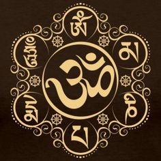 the om shan symbol in gold on a black background