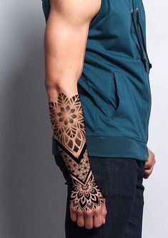 a man with a tattoo on his arm