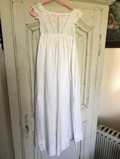 "This beautiful gown dates to around 1890 or earlier. It measures 10\" from armpit to armpit and is 37\"long from shoulder to hem. It is hand sewn and in very good condition, there are two tiny marks please see pics. It has a lace yoke and has lace to the cuffs and hem. The fabric is strong and it is clean and fresh. Ideal for a bisque head doll or theatre, tv props." Empire Waist Maxi Dress With Fitted Bodice For Daywear, Vintage Full Length Daywear Dress, Victorian Prairie Dress With Empire Waist, Victorian Empire Waist Dress For Daywear, Fitted Historical Prairie Dress For Daywear, Victorian Dress With Fitted Bodice And Empire Waist, White Victorian Dress With Fitted Bodice For Summer, Daywear Dresses With Historical Design And Fitted Bodice, White Historical Dress For Daywear