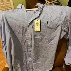 Shirt Is Brand New With Tags Ralph Lauren Blue Collared Shirt, Ralph Lauren Long Sleeve Cotton Top, Blue Collared Ralph Lauren Shirt, Casual Blue Ralph Lauren Shirt, Ralph Lauren Relaxed Fit Long Sleeve Tops, Blue Ralph Lauren Cotton Tops, Casual Ralph Lauren Button-up Top, Ralph Lauren Blue Collared Top, Ralph Lauren Blue Relaxed Fit Shirt