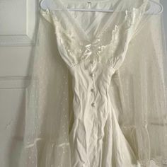 White Laced Dress. Vintage And Gifted From Europe. Extremely Cinched Waist And Super Soft And Silky. Never Worn. Sitting In My Closet Waiting For A New Home :) Send Offers/Bundles! Happy Shopping :) Long White Dress Elegant, White Lace Boho Dress, Silk White Dress, White Dress Aesthetic, Alaska Cabin, Lace Boho Dress, Vintage White Dress, White Silk Dress, Short Grunge Hair