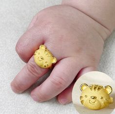 Gold Smile Tiger Baby Ring 24K 0.999 Pure 3.75g 한돈 | It's a perfect gift for a baby who was born in 2022 the Year of the tiger The tiger is the 3rd of the twelve animal signs that make up the Chinese zodiac. Celebrate your loved one's Baeke-il (100days) or Dol(1st birthday party) with our dainty, delicate and simple, minimalist Pure Gold 24K Tiger Ring. It can be engraved on the side of the ring (Any 6~8 characters maximum) -example 1) ARI 2) 02.24.2023 If you select an option for the engraving, Baby Rings Gold, Baby Jewelry Gold, Animal Signs, Tiger Baby, Tiger Ring, Baby Ring, Ring Boy, Baby Rings, Medical Bracelet