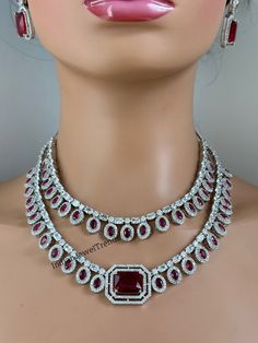 Ruby CZ diamond Layered bridal necklace, American Diamond wedding necklace, Cz jewelry, Indian, Pakistani, Punjabi wedding jewelry Cubic Zirconia 2 Line Necklace With Rhodium Plating Regular Size And Adjustable with rhodium finish Ships from California, USA Delivery in 2-5 business days in the USA. Other colors can be found here https://www.etsy.com/listing/1423097794/sapphire-cz-diamond-bridal-necklace?ref=listings_manager_grid https://www.etsy.com/listing/1423095388/emerald-cz-diamond-bridal-necklace?ref=listings_manager_grid Color, shades, and texture displayed may slightly vary from the actual product due to digital image limitations. We request you consider these minor variations. Please expect the possibility of some slight imperfections when buying handmade jewelry. Please let me kn Diamond White Bridal Necklace With Cubic Zirconia, Diamond White Cubic Zirconia Bridal Necklace With Jewels, Wedding Diamond Necklace With Jewels In Cubic Zirconia, Wedding Diamond Necklace With Cubic Zirconia, Wedding Cubic Zirconia Diamond Necklace, Wedding Diamond Necklace With Jewels, Diamond Jeweled Bridal Necklace For Wedding, Diamond Bridal Necklace For Wedding, Wedding Diamond Bridal Necklace With Jewels