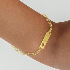 Identification Identification Bracelet for Children14k Yellow GoldClasp: Spring Ring Figaro ChainMetal Stamp: 14kAge Group: Ideal for Infants, Toddlers and Kids Bracelet Length: 5.5 inches (14 cm) - Adjustable to 4.5 inches (11.5cm) Adjustable Yellow Gold Heart Bracelet, Gold 14k Heart Bracelet, Elegant Nameplate Figaro Chain Jewelry, Classic Yellow Gold Adjustable Heart Bracelet, Classic Adjustable Yellow Gold Heart Bracelet, Yellow Gold Plated Figaro Chain Bracelet, Hypoallergenic Yellow Gold Rectangular Jewelry, Hypoallergenic Rectangular Yellow Gold Jewelry, Yellow Gold Rectangular Name Bracelet As Gift