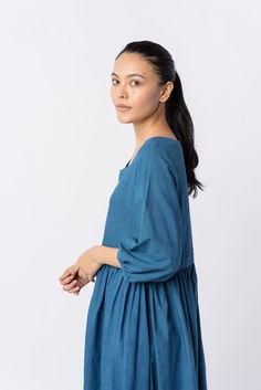 Effortless elegance in this indigo midi dress with waist gathers, a relaxed fit, and a gentle scoop neckline. Crafted from soft textured cotton, it offers year-round comfort and versatility for your everyday style. Indigo Color, Indigo Colour, Quarter Sleeve, Scoop Neckline, Midi Length, Casual Dress, Color Pop, Midi Dress, Spring Summer