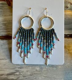 image Bohemian Long Drop Fringe Earrings, Bohemian Chandelier Earrings With Tassels, Bohemian Long Drop Chandelier Earrings With Tassels, Beaded Fringe Dangle Tassel Earrings For Festival, Bohemian Chandelier Earrings With Fringe And Round Beads, Bohemian Chandelier Earrings With Fringe, Bohemian Beaded Dangle Earrings With Fringe, Bohemian Beaded Fringe Dangle Earrings, Fringe Dangle Chandelier Earrings For Festival