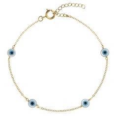 a gold bracelet with blue evil eyes on the link and two small beads hanging from it