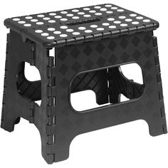 a gray plastic step stool with holes in the bottom