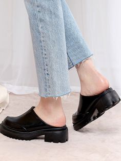 Editor's NotesSPUR's shoes are unique and timeless for everyday wear.- Platform Mules- Chunky lug sole- Modern trendy round front toe - Glossy leather texture- Feminine and minimal style- Easy slip-onMeasurements(in.)- Size: KR 230MM (US 6) ~ KR 250MM (US 8)- Heel Height: 2in.Composition & Care- Synthetic leather - Avoid direct heat and moisture- Professional cleaning is recommendedDesigner- by SPUR Slip-on Closed Toe Heels With Textured Sole, Slip-on Platform Heels With Round Toe, Casual Pointed Toe Chunky Platform Heels, Casual Platform Loafers With Leather Sole And Closed Toe, Trendy Heels With Rubber Sole And Round Toe, Trendy Heels With Round Toe And Rubber Sole, Casual Round Toe Heels With Rubber Cap, Casual Heels With Rubber Heel Cap And Round Toe, Slip-on Platform Loafers With Closed Toe