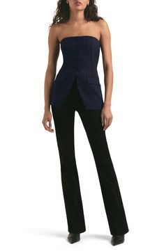 Traditional pinstripes line up for out-of-office wear in a bustier top designed with suiting style. 21" center front length (size 8) Front button closure Strapless Front flap pockets Lined 65% polyester, 33% rayon, 2% spandex Dry clean Imported Chic Fitted Vertical Stripes Tops, Chic Fitted Top With Vertical Stripes, Chic Fitted Tops With Vertical Stripes, Chic Pinstripe Tops For Office, Elegant Fitted Pinstripe Tops, Chic Pinstripe Office Tops, Fitted Vertical Stripes Office Tops, Chic Pinstripe Tops For Work, Fitted Striped Top For Business