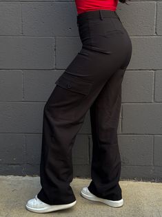 Twill cargo wide leg pant. Pant is true to size. Color: Black Material: 94% Polyester 6% Spandex Model is wearing a size small. Bust 32' Waist 26' Hip 35' Black Cargo Style Full Length Work Pants, Fitted Black Cargo Work Pants, Fitted Black Work Pants With Cargo Pockets, High Waist Stretch Black Cargo Jeans, Black Stretch High Waist Cargo Jeans, Utility Bottoms With Pockets For Night Out, Black Full Length Cargo Pants, Fitted Straight Cargo Pants For Night Out, Black Cargo Bottoms For Workwear