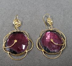 -PRODUCT TYPE - GOLD EARRING WITH TOURMALINE -MATERIAL - GOLD  -PURITY - 18K  -STONE TOURMALINE - 67.15 CARAT APPROX -GOLD WEIGHT - 18 K - APPROX - 5.080 GRAMS -TOTAL WEIGHT - APPROX - 18.510 GRAMS -Quality is guaranteed. Our mission is always to satisfy our customers with our offerings, so just relax and place order! -Handling time is 1-2 Weeks. -Various designs are available so please feel free to drop a message. We will be happy to serve you. -We are continuously adding new products in our store. So keep coming back to see more great deals. -If you are happy with our products and service please rate us. This will cheer us up and our team too. Do mark our shop as favorite as we keep coming out with new beautiful articles. This will always keep us in touch. -In case if you have any issues Modern Gold Tourmaline Jewelry, Tourmaline Gemstone Earrings In Fine Jewelry Style, Fine Jewelry Tourmaline Gemstone Earrings, Gold Tourmaline Dangle Jewelry, Elegant Dangle Tourmaline Jewelry, Elegant Tourmaline Teardrop Earrings, Yellow Gold Tourmaline Gemstone Earrings, Elegant Tourmaline Dangle Earrings, Gold Tourmaline Jewelry For Weddings