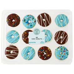 twelve iced donuts with chocolate and sprinkles