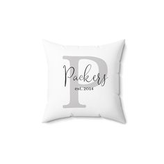 a white pillow with the letter p printed on it and black lettering that says packers