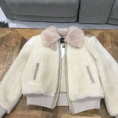 Coach Shearling Jacket Size Xl Brand New With Tags Chest Apprx 46 Around Will Fit Sizes 14-16 Best Luxury Cream Fur Coat With Faux Fur Lining, Cream Sheepskin Fur Coat For Winter, Luxury Cream Fur Coat For Winter, Luxury Beige Sheepskin Fur Coat, Cream Shearling Fur Coat For Fall, Winter White Sheepskin Fur Coat For Fall, Winter White Shearling Outerwear, White Shearling Long Sleeve Outerwear, White Shearling Outerwear For Winter